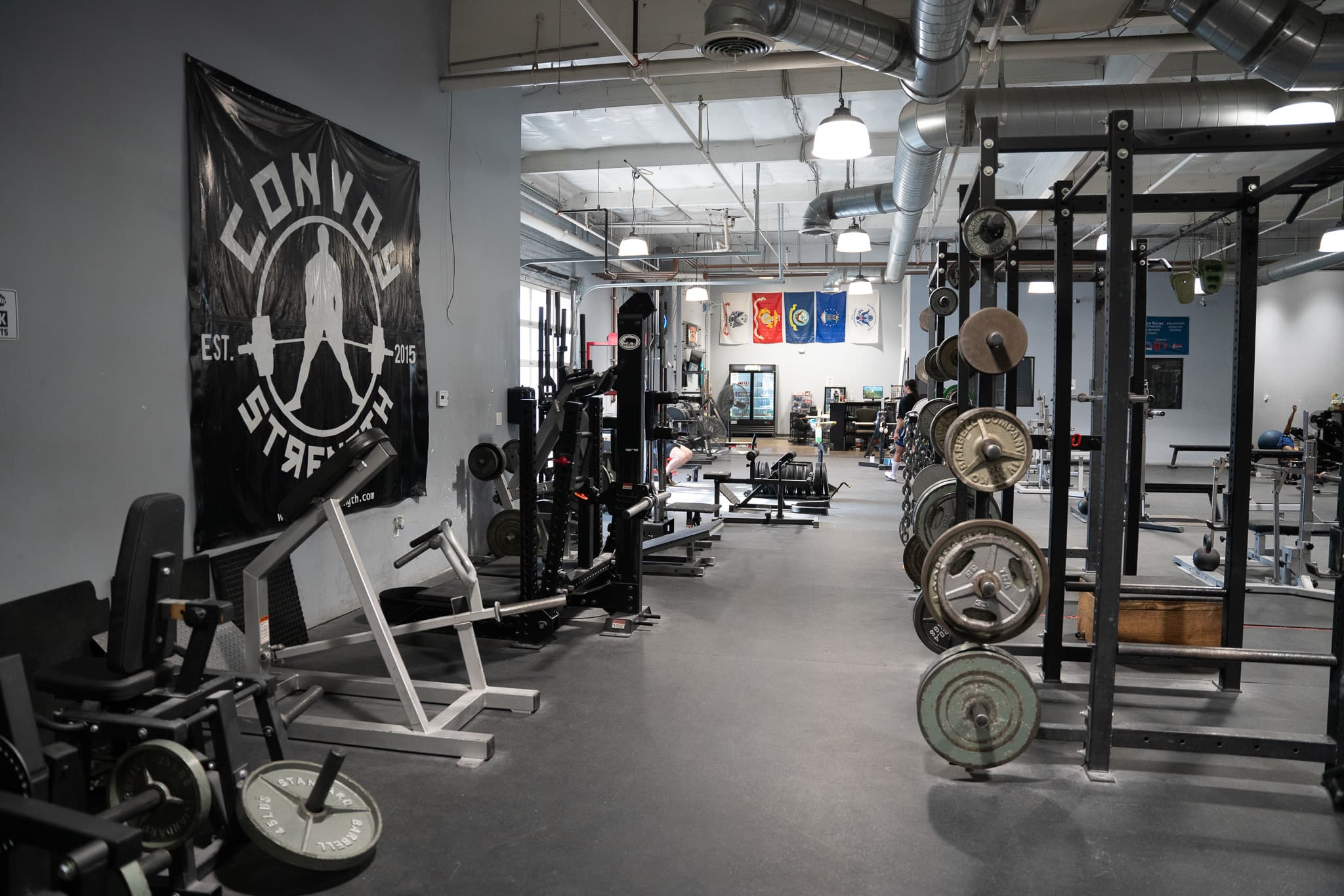 The Convoy Strength training floor, with loaded bars under the Convoy wall mark